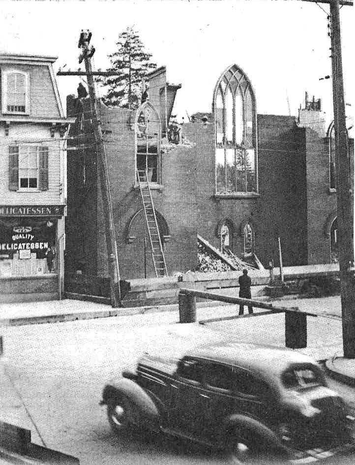 Universalist church being torn down.